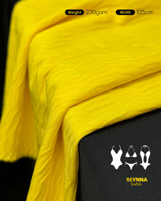 เนื้อผ้าว่ายน้ําที่มีเนื้อเยื่อพรีเมี่ยม 85% โพลิเอสเตอร์รีไซเคิล + 15% สปันเด็กซ์ ความกว้าง 125 ซม. และความทนทานสูงสําหรับชุดว่ายน้ํา